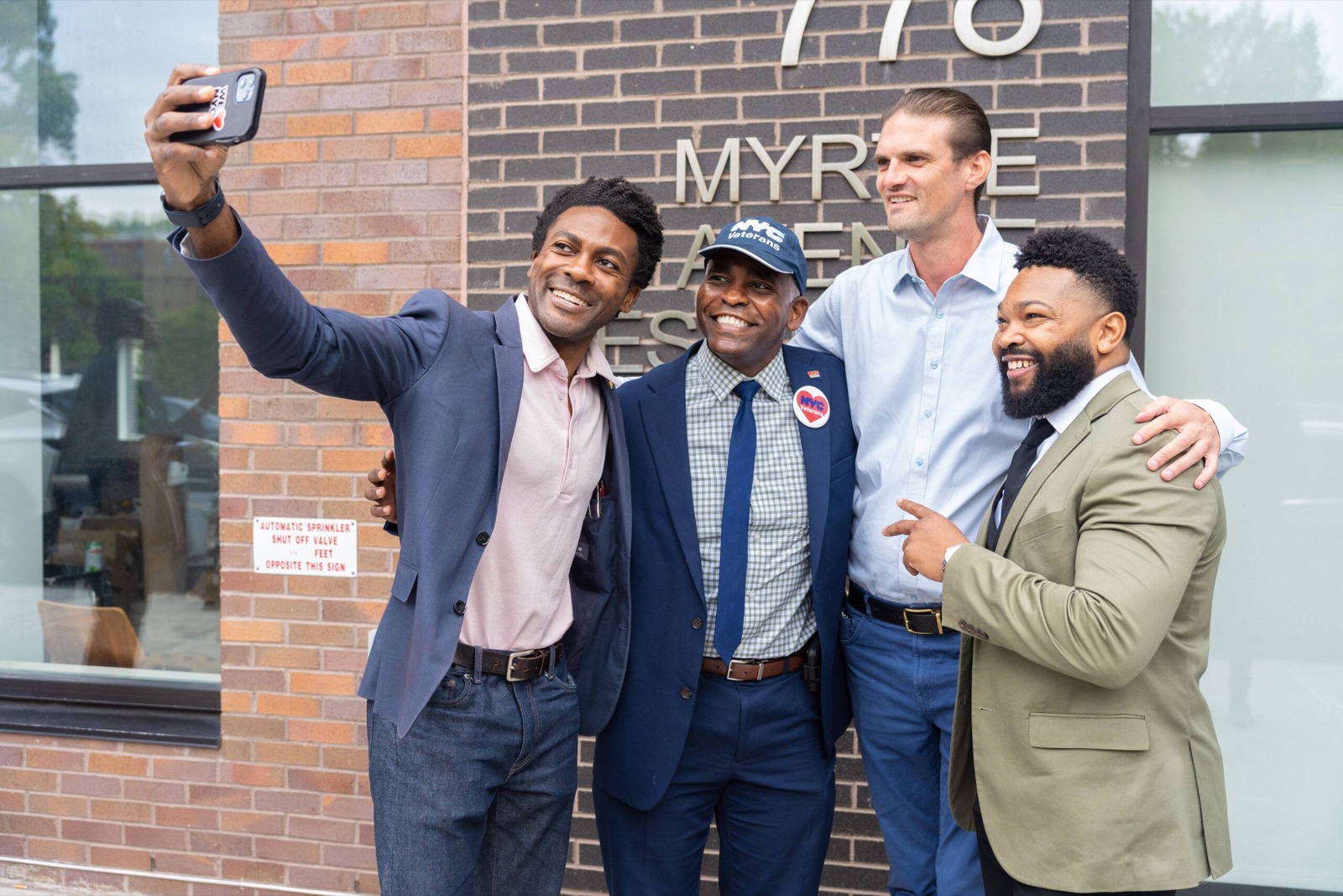 Sam with partners at the IMPACCT Brooklyn ribbon-cutting